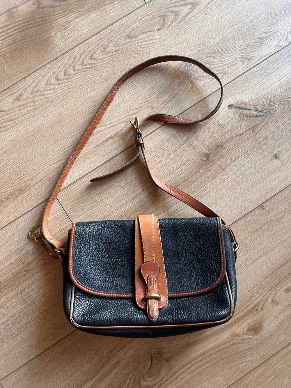 Dooney & Bourke Black and Tan Leather Crossbody Bag